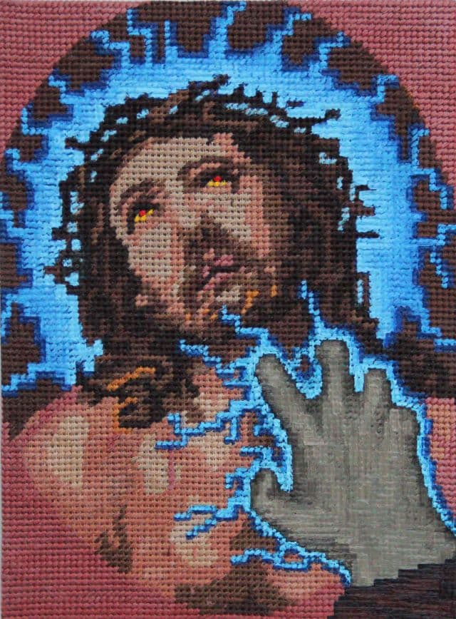 Vojtêch Luksch blends violent retro video games with the “grandma-core” of embroidered canvases